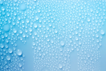 Water Drops. Bubbles close-up. The texture of gel cream. Oxygen bubbles in clear blue water,...