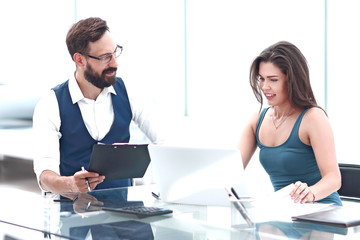 Fototapeta premium young business woman sitting at her Desk