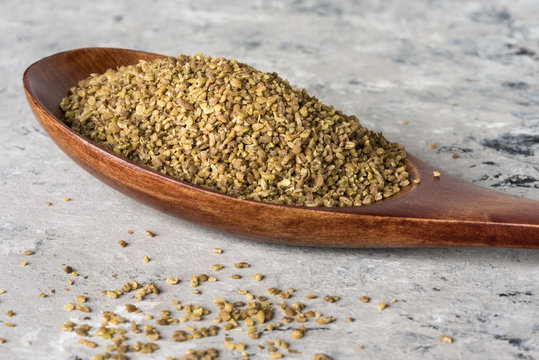 Anise Seeds on a Wood Spoon