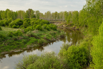 View of the taiga Siberian river Vagai. Spring landscape.