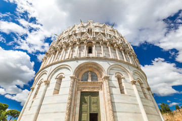 The Pisa Baptistery of St. John in Square of Miracles at sunny day, Tuscany region, Italy.
