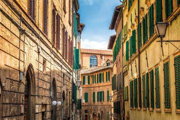 Fototapeta premium Street of Siena town, an ancient city in the Tuscany region of Italy, Europe.