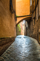 Obraz premium Street of Siena town, an ancient city in the Tuscany region of Italy, Europe.
