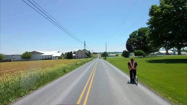 Driving Along Amish Countryside Came Across an Amish Man on a Scooter