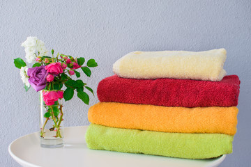 Obraz na płótnie Canvas Bath towels of different colors.