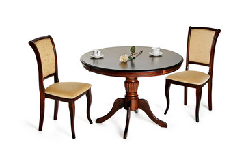 Two chairs and round table isolated on white
