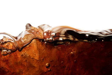 Close up cola soda with ice and bubble in glass on white background cold drink beverage