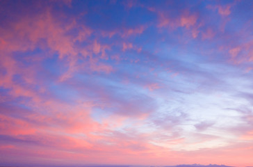 Naklejka na ściany i meble Beautiful sunset clouds in pink colors