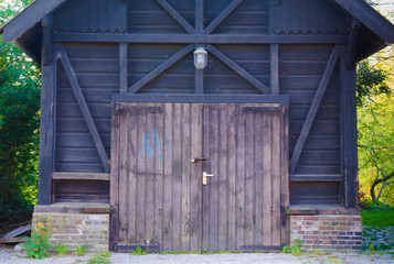 barn door tagged with graffiti by hoodlums