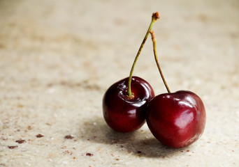 Bunch of sweet cherries on a granite table