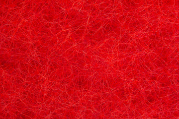 Close-up of red hairy texture. Nanofibers and molecular bonds. Nanostructure Science and modern nanotechnology. Image under the microscope. Background and abstract red pattern.