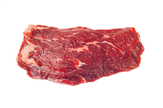 Crude raw rib eye steak  meat on a white backgrounds