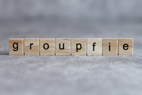 Groupfie word written on wood cube