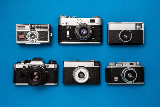 Vintage Camera Collection On Blue