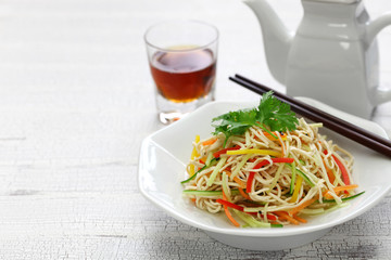 Tofu noodle salad chilled and dressed with sauce, chinese vegan cuisine