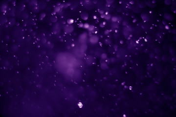 Bokeh purple proton background abstract