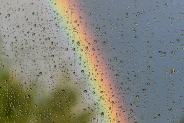 rainbow rain drops glass sky