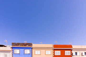 Fototapeta na wymiar View of the sky and colorful, beautiful buildings in the Canary Islands, Gran Canaria.