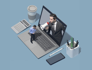 Boss shouting to an employee using a megaphone