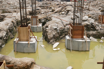Pile cap and column stump under construction at the construction site. Constructed using reinforced...