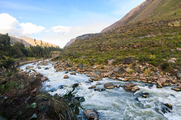 Urubamba or Vilcanota River running alongside the Inca Trail to Machu Picchu, near Cusco, in the...