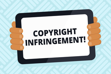 Handwriting text writing Copyright Infringement. Conceptual photo use of works protected by law without permission Color Tablet Smartphone with Blank Screen Handheld from the Back of Gadget