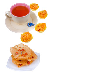 Tea cup , rempeyek and honey corn flake cookies  on white background