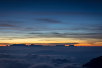 A stunning colorful mountain sunset or sunrise on campsite 7 mount Raung. Raung is the most challenging of all Java’s mountain trails, and the most active volcanoes on the island of Java Indonesia.