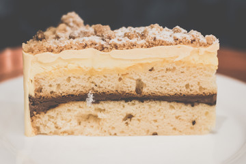 Jaffa Cake Vanilla pound cake sandwiched between rich chocolate mousse, orange jam and mousse.ine,...