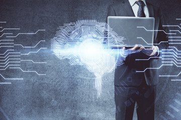Businessman with computer background with brain theme hologram. Concept of brainstorm. Multi exposure.