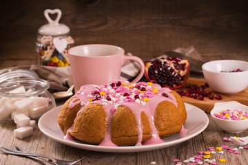 Cake with pink frosting.