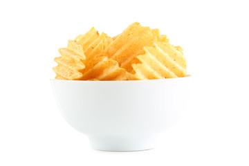 Potato chips in bowl isolated on white background