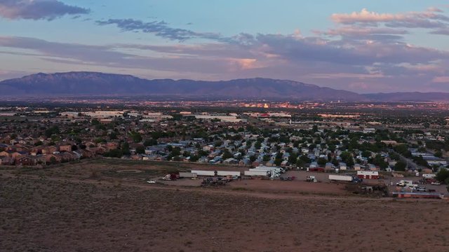 Stunning drone aerial shot of  Albuquerque New Mexico suburbs Toward Sandia Mountains.