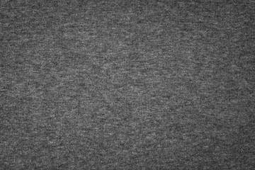 Grey cotton texture background. Detail of sweater fabric surface.