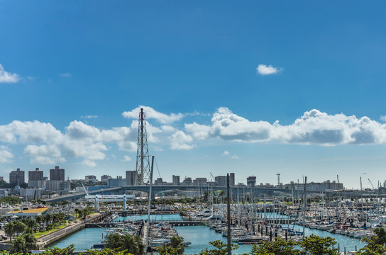Leisure boats lined in the Ginowan harbor marina seen from Okinawa conversion center