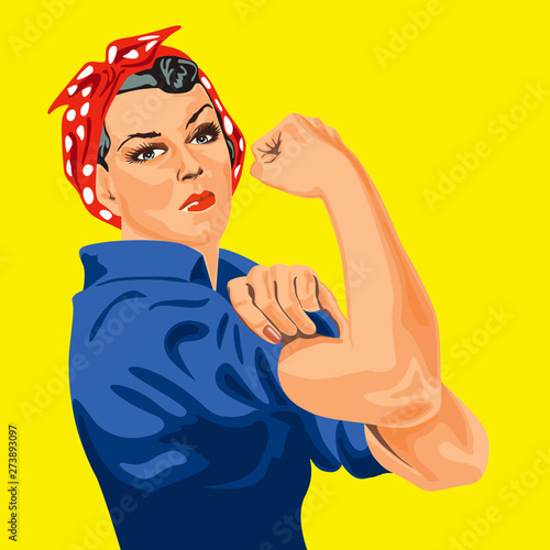 "Symbole du féminisme, une femme retrousse les manches de sa chemise