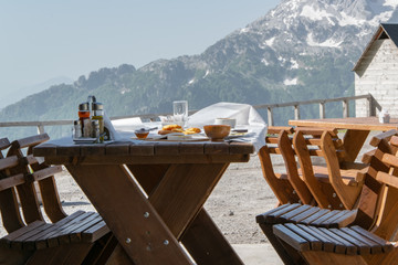 Fototapeta na wymiar Mountain resort table with healthy breakfast. Albania, Europe
