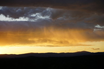 Sunset Over Mountains with Clouds