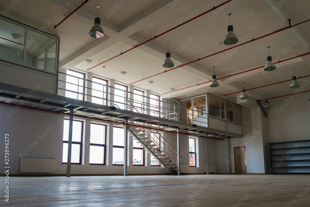 Wall mural Interior of a large empty room