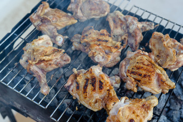 Chicken pieces are grilled. Mediterranean Kitchen