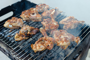 Chicken pieces are grilled. Mediterranean Kitchen