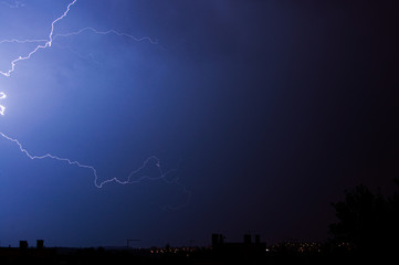 Lightning on the sky during summer storm 