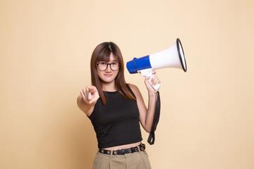 Beautiful young Asian woman announce with megaphone.