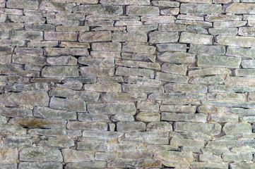 stone wall texture made of natural flat stone