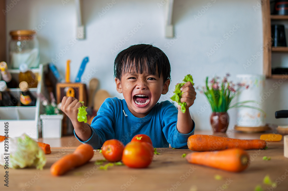 Wall mural the boy who shows an angry emotion, the concept of emotion of a violent child