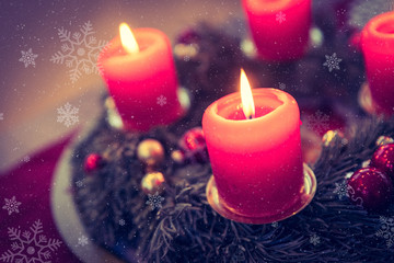 Traditional Christmas decoration: Advent wreath with red lights