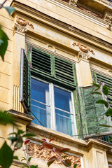 Fototapeta na wymiar Beautiful old building at Friedrich Schiller Square in Sibiu, Transylvania, Romania, exterior partial view