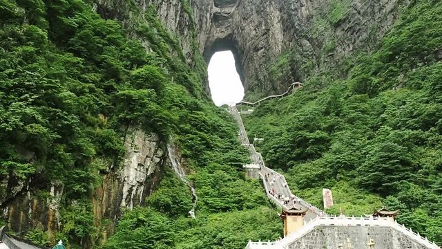 The Tianmen Mountain with a view of the cave Known as The Heaven's Gate and the steep 999 stairs at Zhangjiagie, Hunan Province, China, Asia