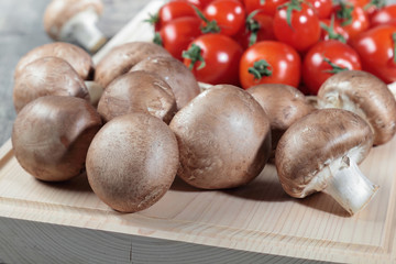 A lot of champignions in the wooden box