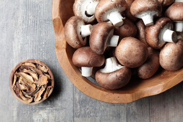 A lot of champignions in the wooden box